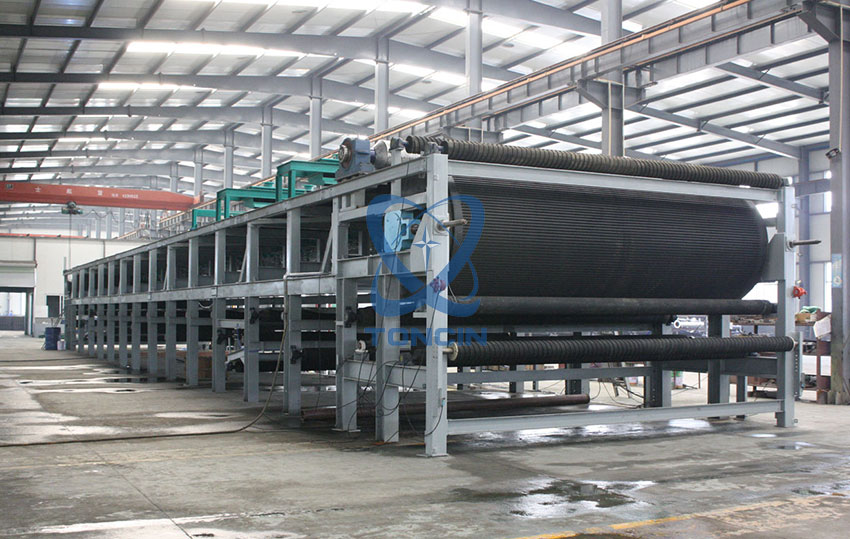 Sistem dewatering lumpur press filter sabuk otomatis untuk penambangan